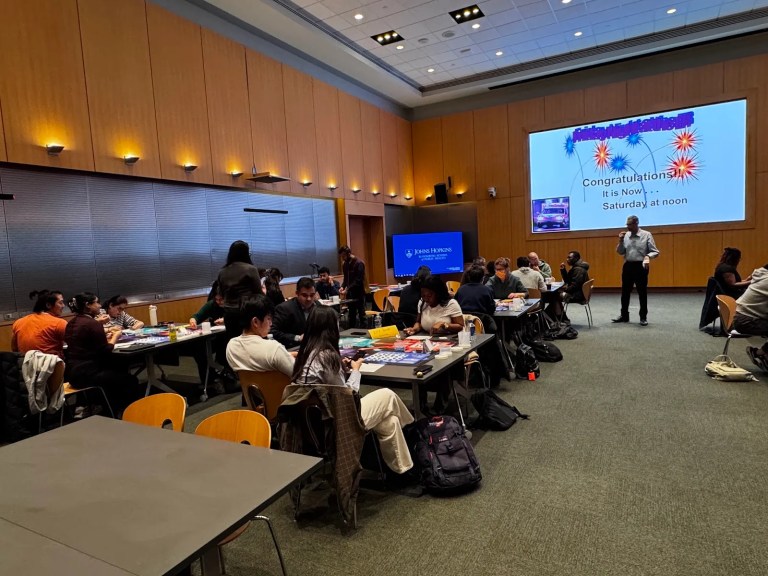 Students working in groups during a class session, March 2025